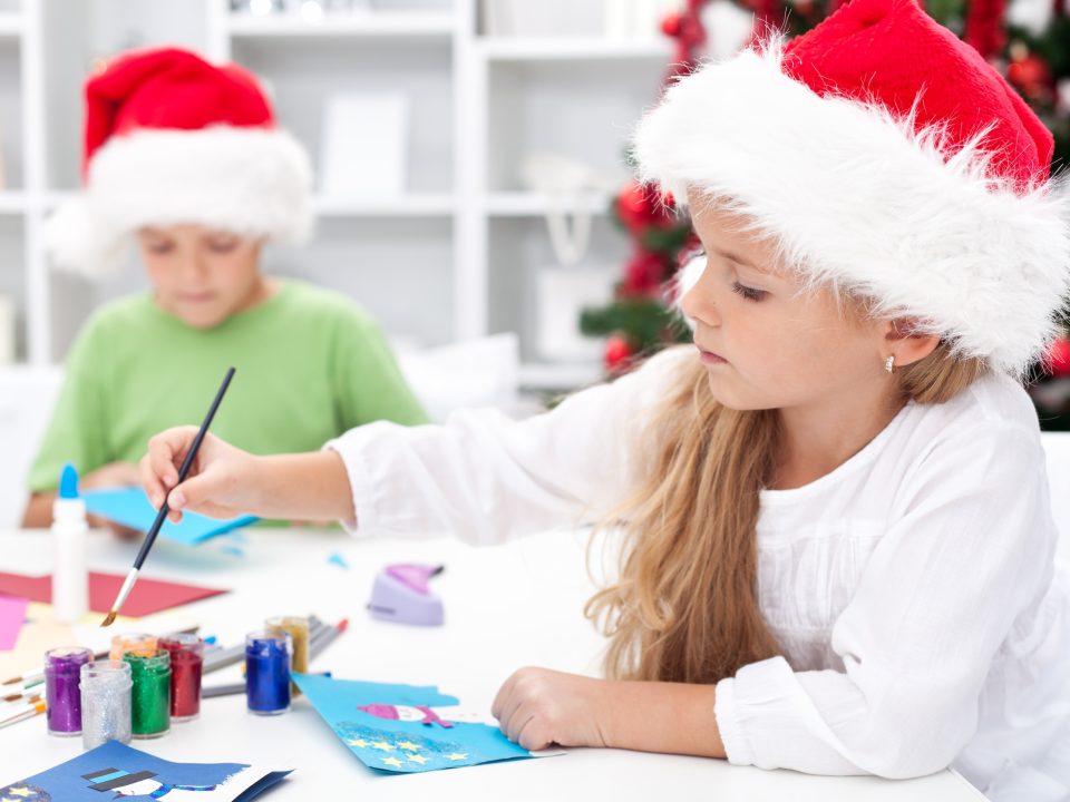 Kids doing a holiday craft