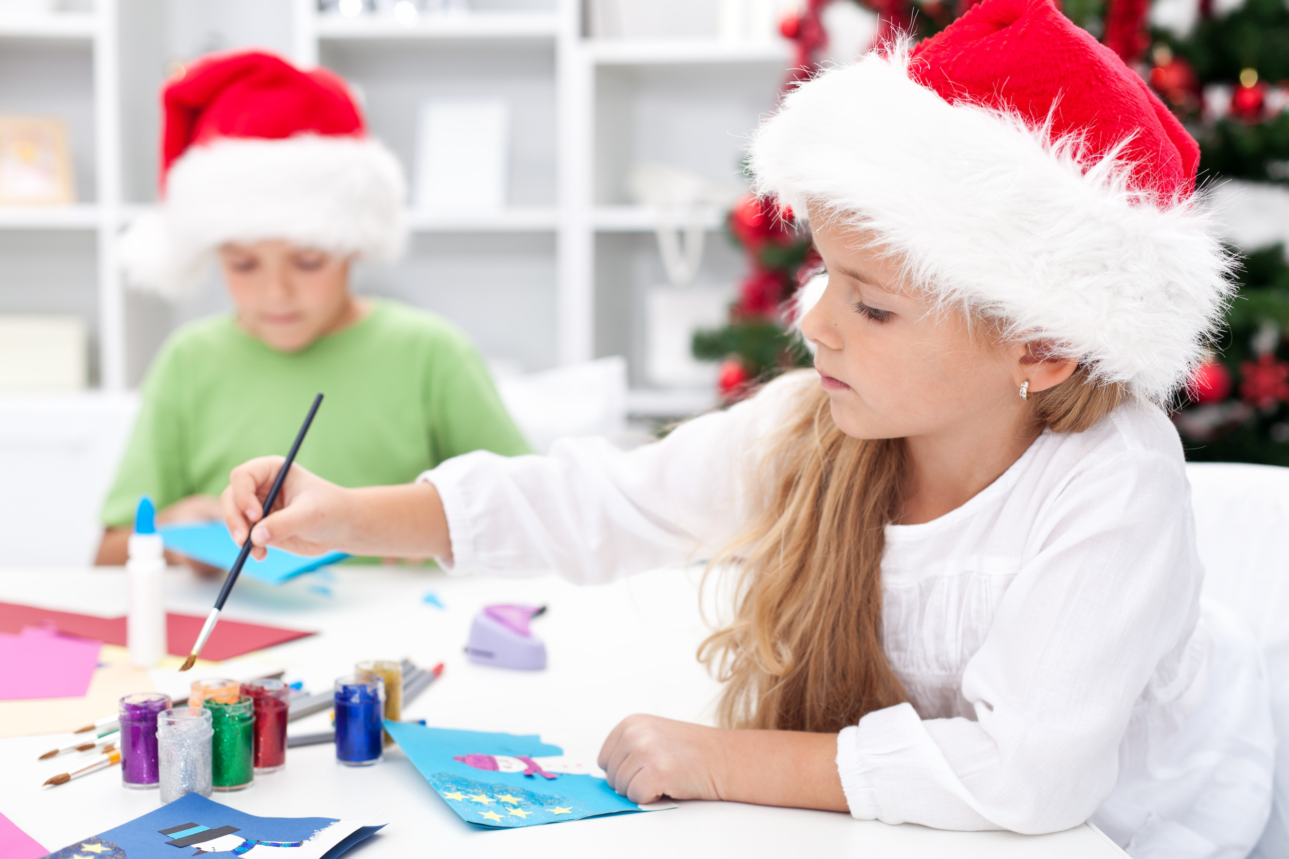 Kids doing a holiday craft